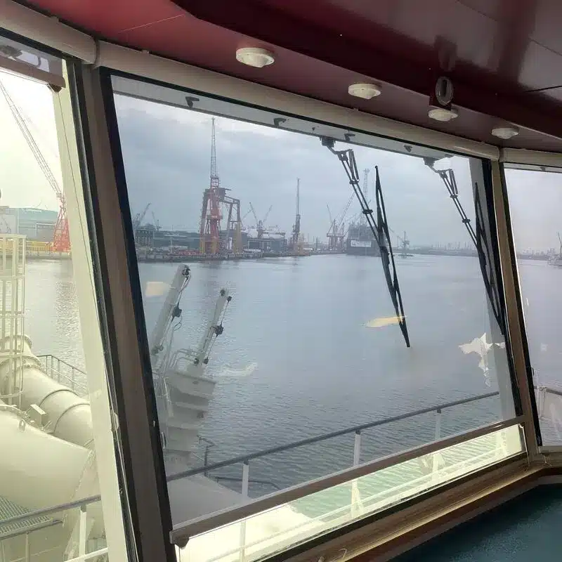 NaviGlare solar screen roller blinds installed on a ship’s marine bridge windows for sun and glare protection